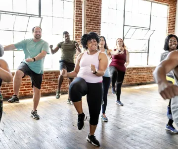 Group of people working out together having fun