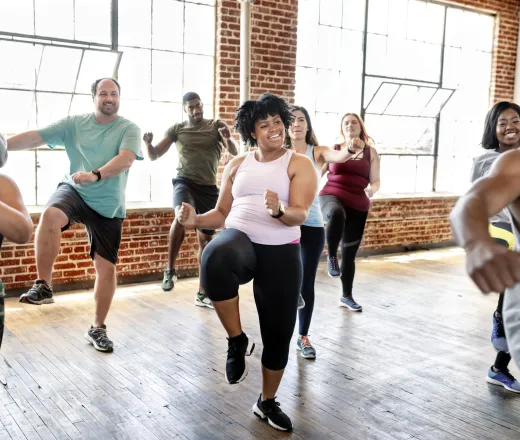 Group of people working out together having fun