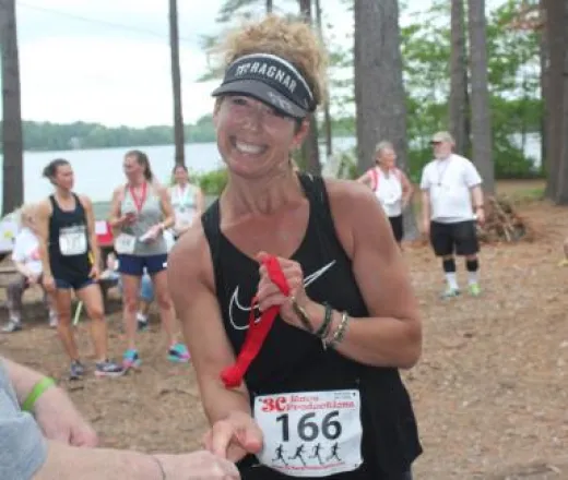 Happy participants getting congratulated for finishing a fundraising walk &amp; run - Tispaquin Run And Woody's Walk