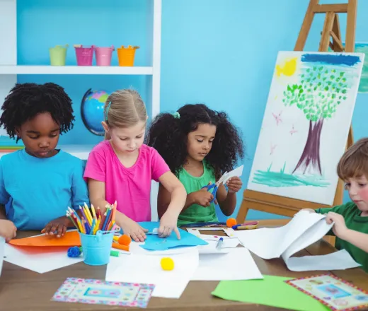 Happy kids doing arts and crafts together